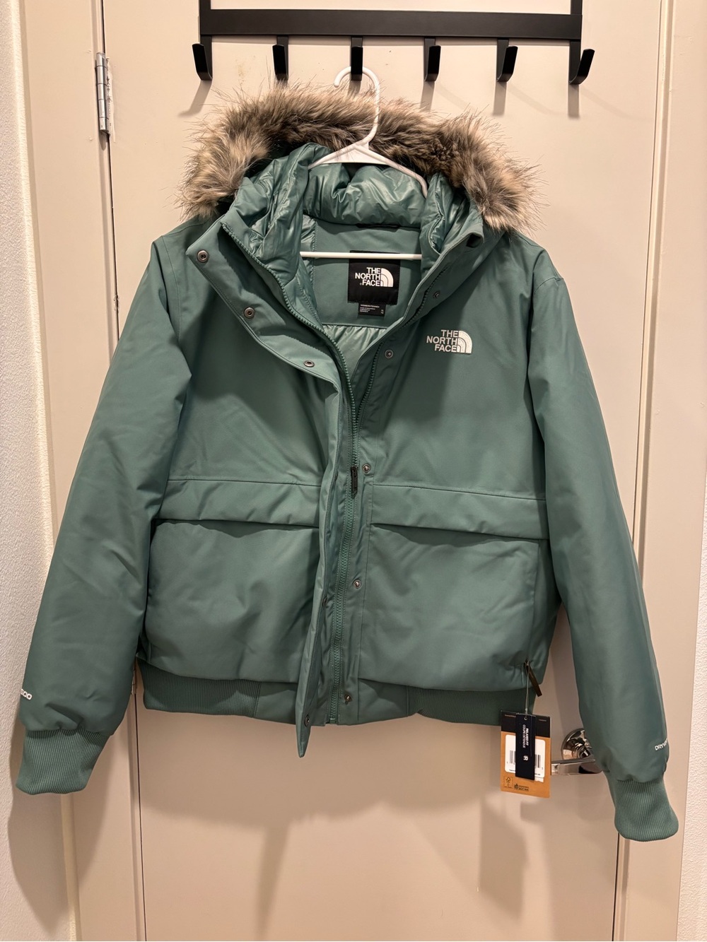 The North Face Women's Teal Puffer Jacket with Faux Fur Hood